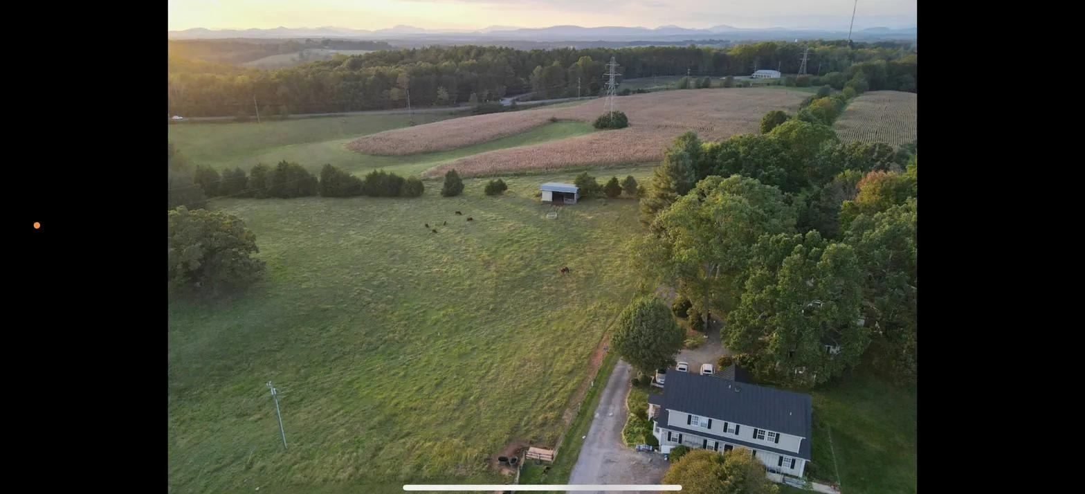 Aerial view of Belle Meade with the Blue Ridge Mountains at sunset
