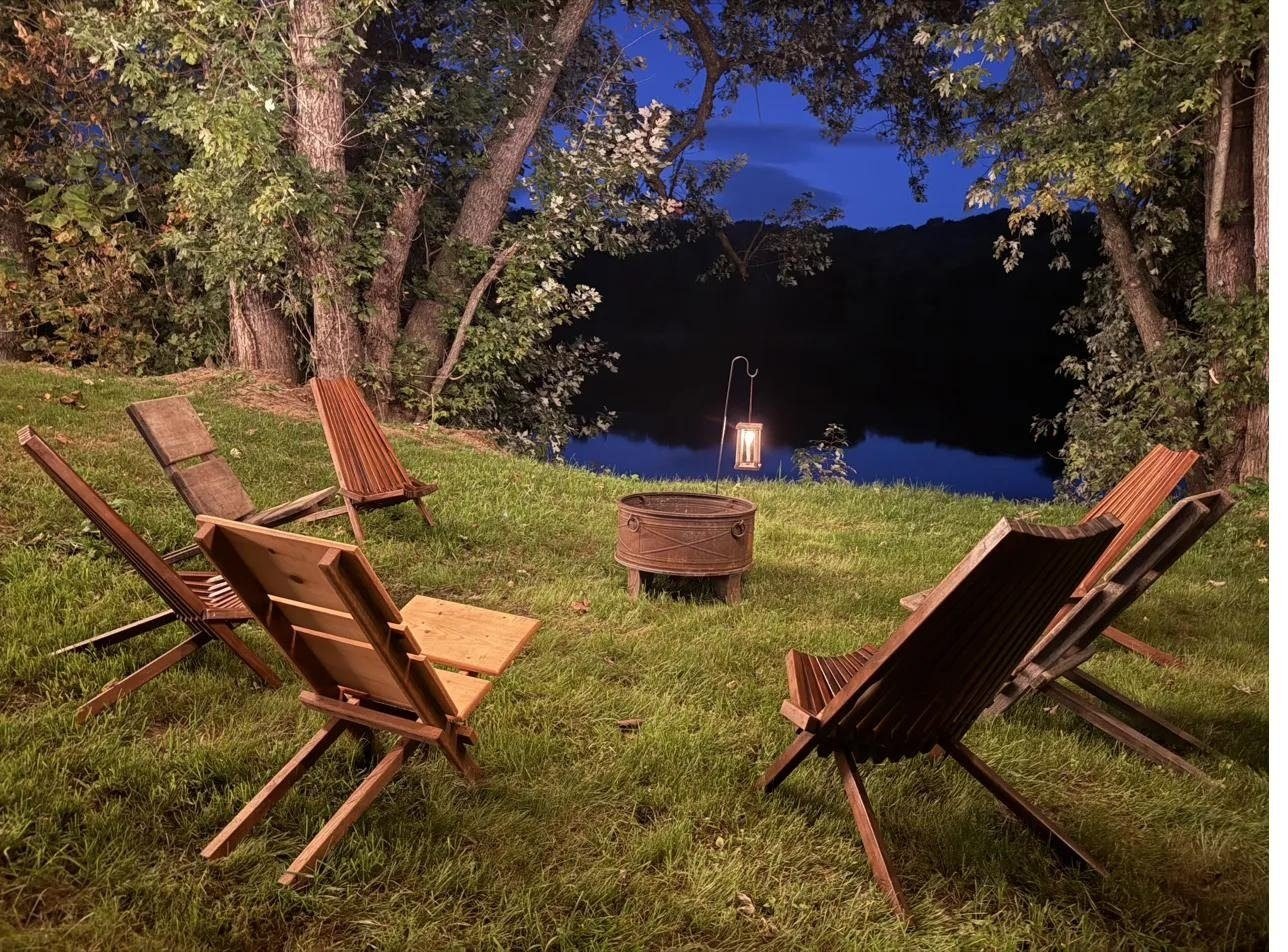 Fire pit by the river at blue hour