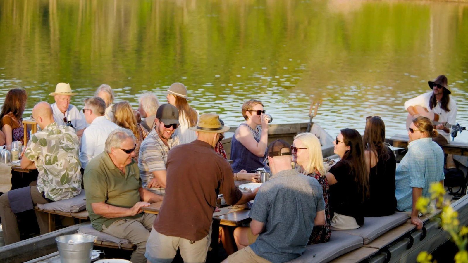 Golden-hour supper on the batteau with live music