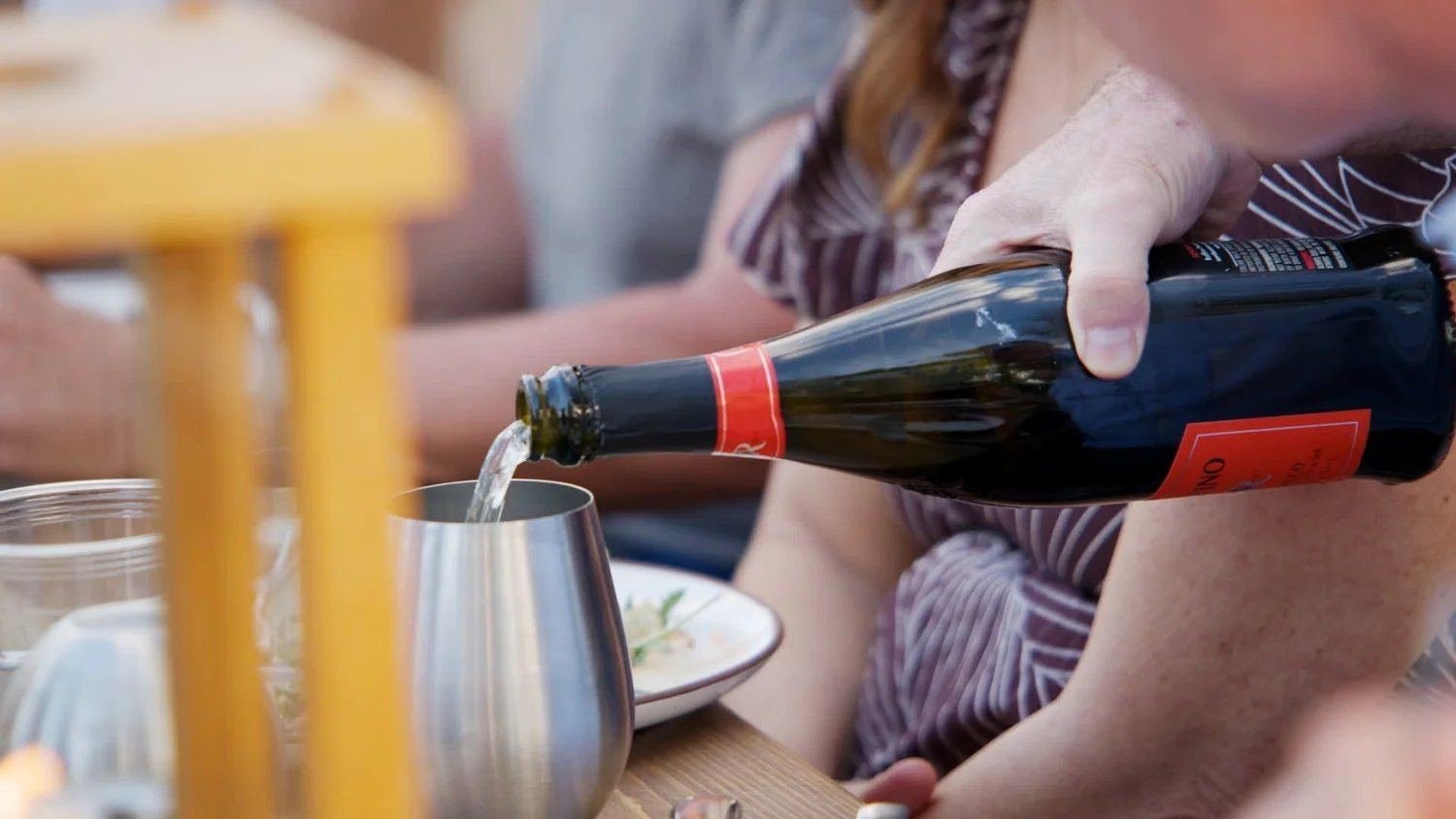 Wine poured at the river supper