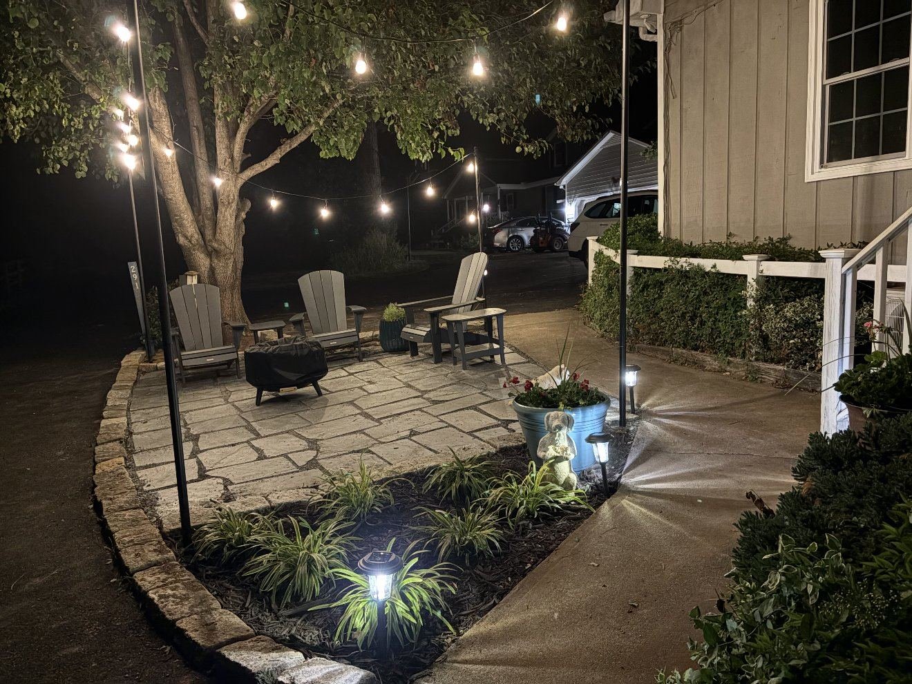 Meadowview Suite patio with pavers at night