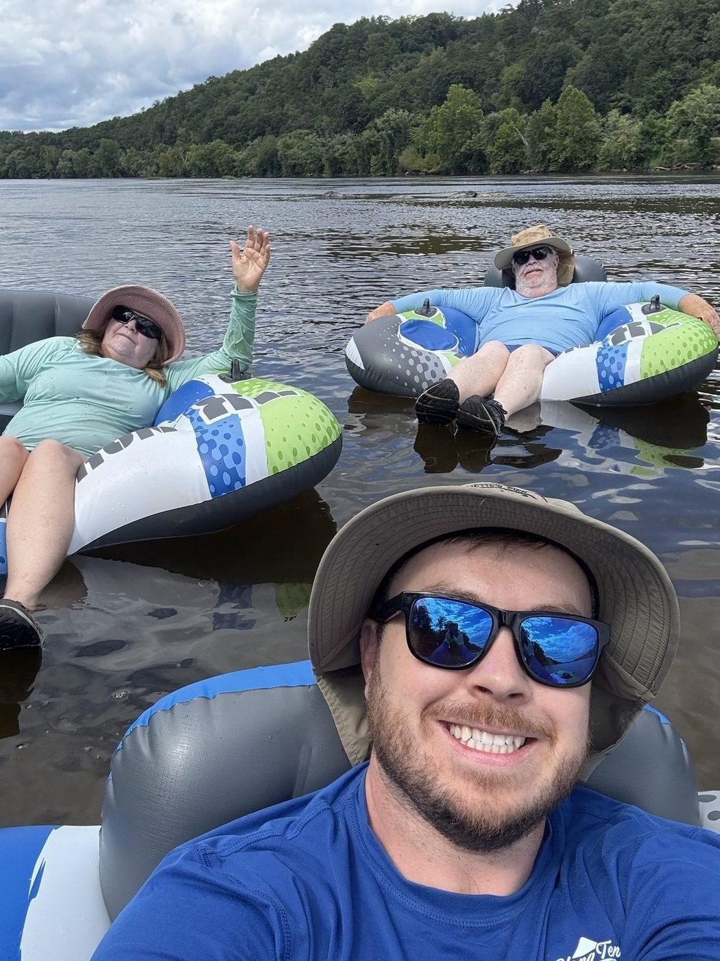 Charlie, Pam and George Goodwin tubing the James River
